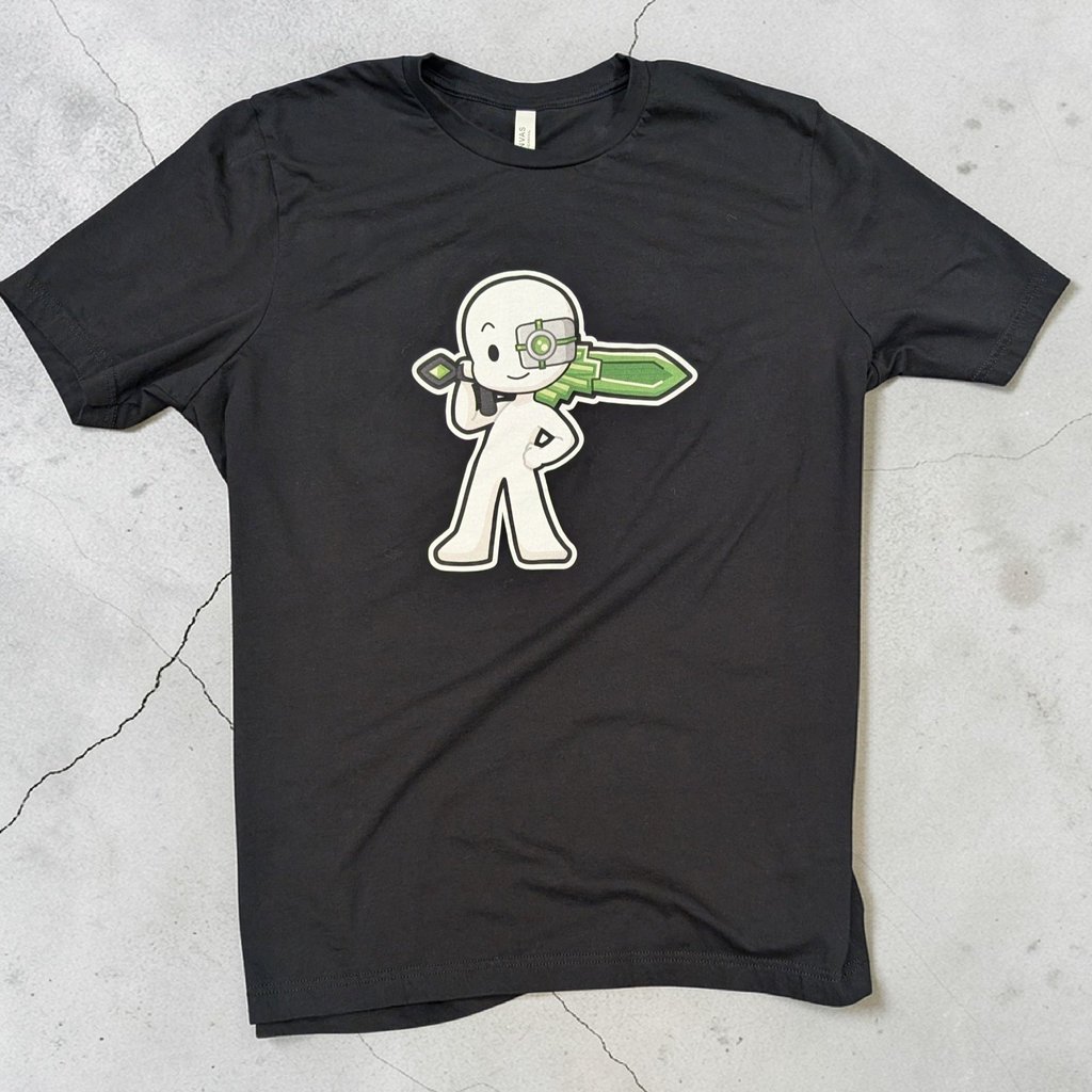 Black t-shirt with a white graphic design on a gray concrete surface